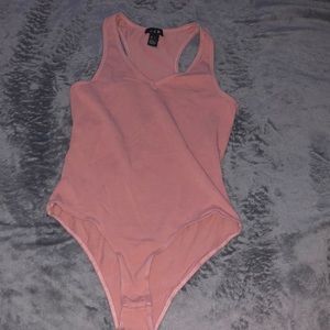 This bodysuit is a small and it’s stretchy